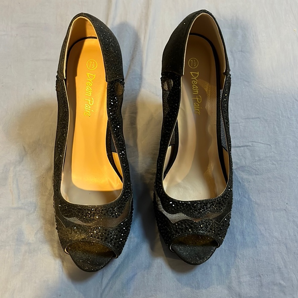 Black sparkle and lace high heels.